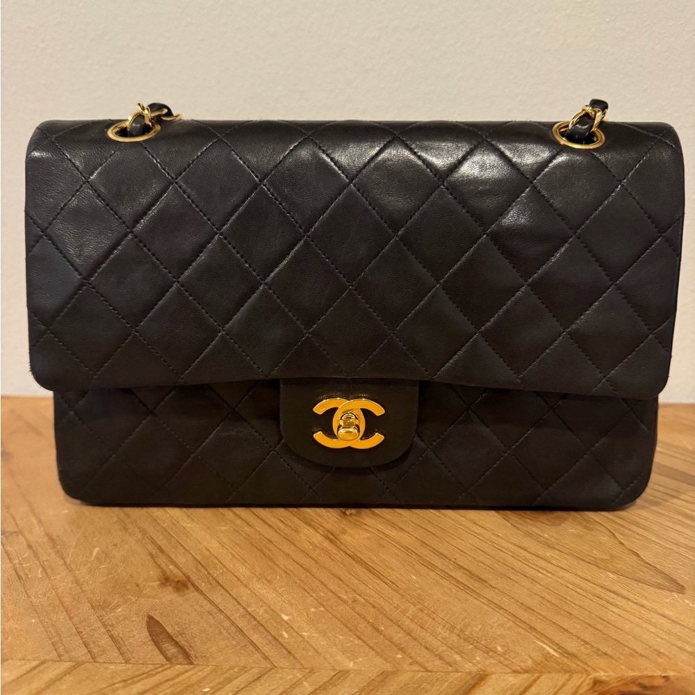 CHANEL Black Quilted Shoulder Bag with Gold Accents